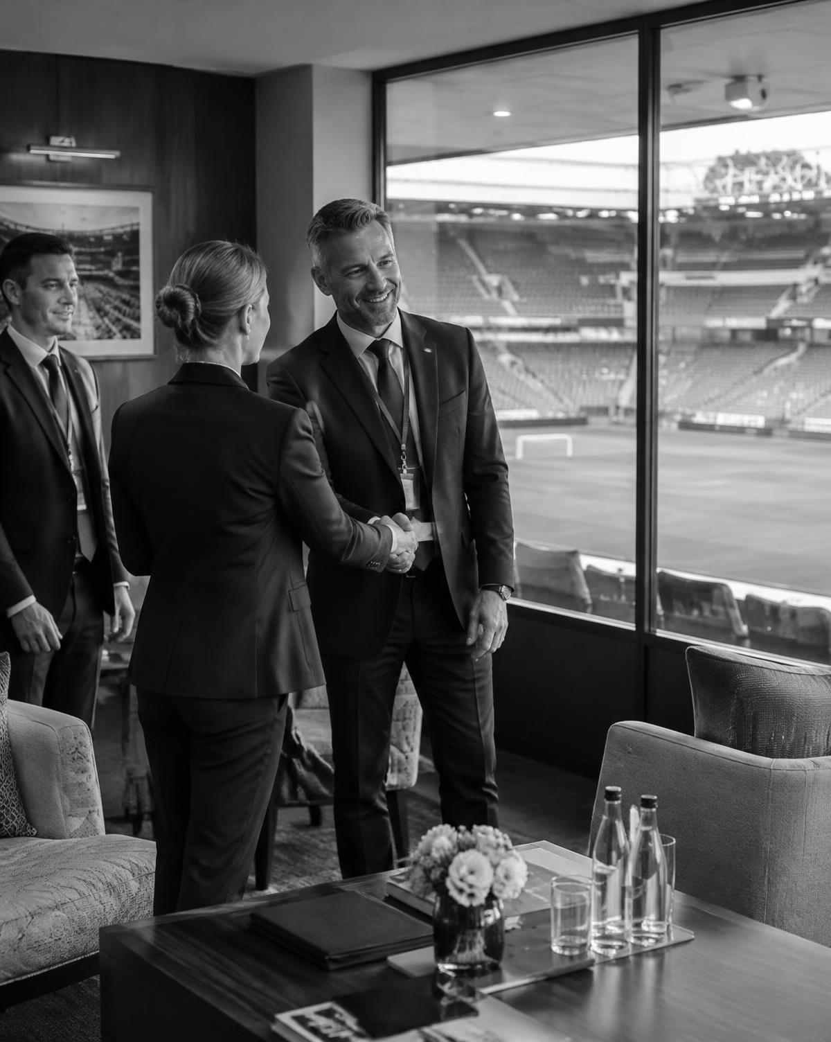 Business meeting in a stadium hospitality lounge